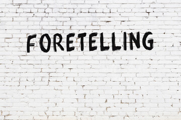 Inscription foretelling painted on white brick wall
