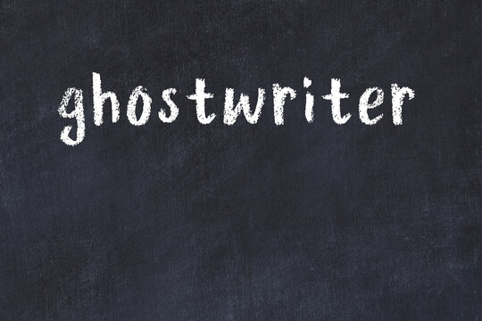 White wall with black paint inscription ghostwriter on it