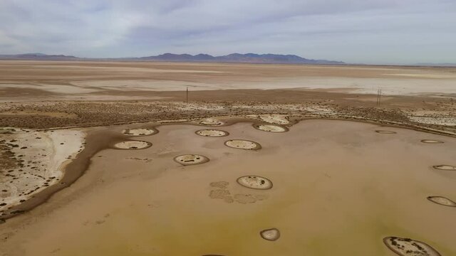 Strange ring-shaped patterns on Willcox playa, drone backwards
