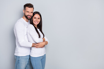 Profile photo of cute millennial couple hug near ad wear white shirt isolated on grey color background