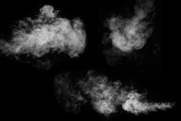 White smoke collection on black background. Fog or smoke set isolated on black background. White cloudiness, mist or smog background.