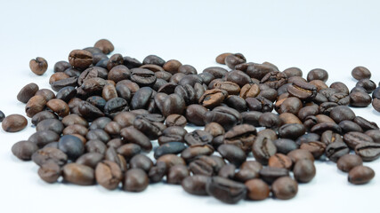 roasted coffee beans isolated on a white background.