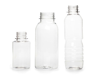 three different empty plastic bottles isolated on white background. production of new containers