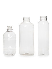 three different empty plastic bottles isolated on white background. production of new containers