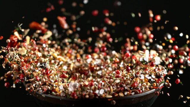 Super slow motion of crushing spice mix in grinder. Filmed on high speed cinema camera, 1000 fps.