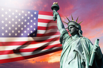 Symbols of USA. America's flag and Statue of Liberty. USA banner on sunset sky background. Monument dedicated to Declaration of Independence of United States. State symbol of America.