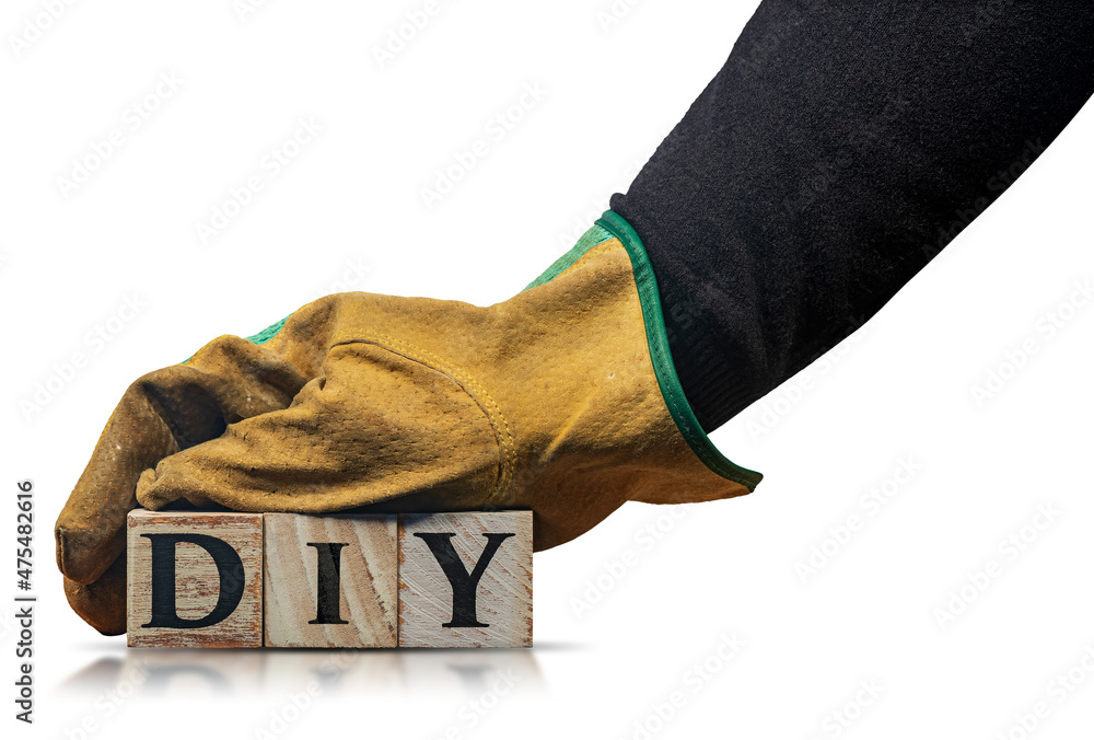 Poster manual worker with protective work gloves, holding the text diy (do it yourself), made of wooden blo