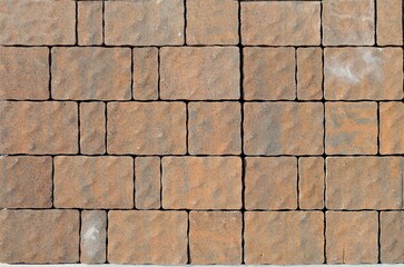 Obraz premium Snap lock tiles for exterior pavement made of granite mix. Background and texture