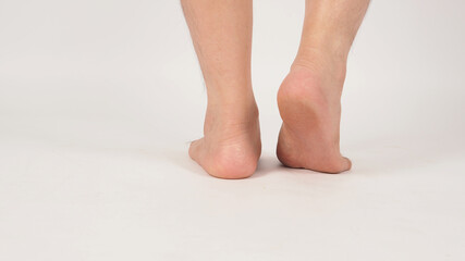 Asian Male heel barefoot is isolated on white background.