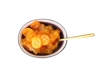 Bowl of tasty kumquat jam on white background