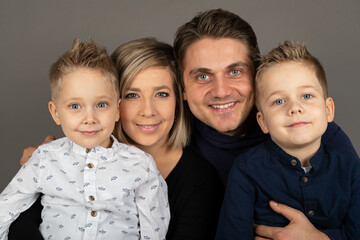 Happy family studio portrait