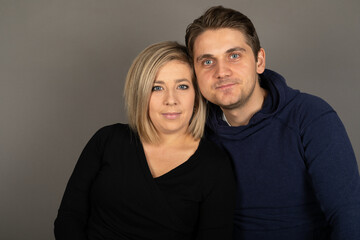 Happy couple studio portrait