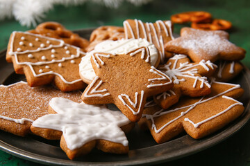 Plate with delicious Christmas cookies, closeup