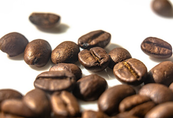 Coffee beans lying on a white background.Close-up.Macro