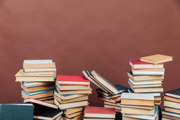 old study books in the university library for exams