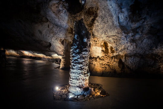 Giant stalagmite in a an underground cave