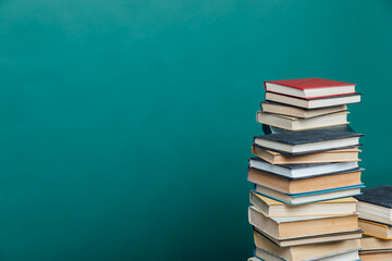 old study books in the university library for exams