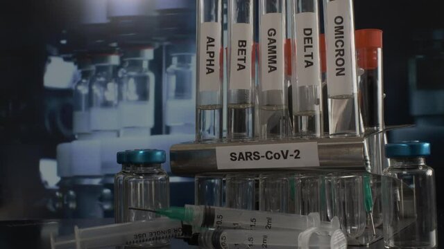 Scientists test for Covid-19 By using science tubes to research and treat illness in a lab or hospital. Medical treatment concepts tubes of Alpha beta gamma delta omicron and sarcs cov 2.