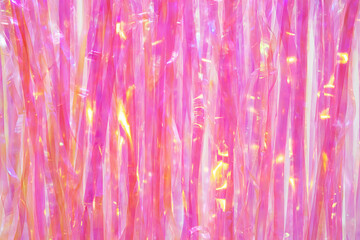 Trendy vibrant foil tinsel background. Glitter tinsel curtains party decoration. 