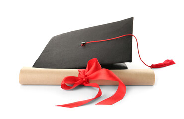 Graduation hat and diploma on white background