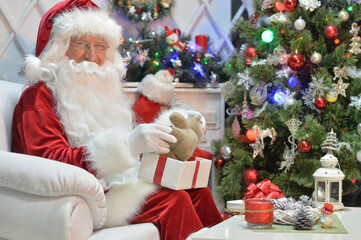 Portrait of  Santa Claus with gift