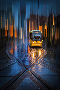 Manchester Tram At Stop In Rain With ICM