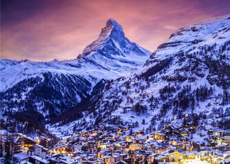 Zermatt town with Matterhorn with Christmas illumination during twlight. Zermatt is a famous recreational place for outdoor activities for vacations