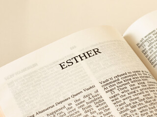 Esther Bible open Book Old Testament Scripture. Studying the Word of God Jesus Christ. A close-up....