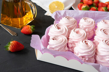 Traditional marshmallows on a plate on the kitchen table