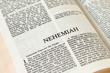 Nehemiah Bible open Book Holy Christian Scripture Old Testament. Biblical concept. Pages of the...