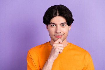 Fototapeta premium Photo of young happy charming man minded thoughtful smart hand chin isolated on purple color background