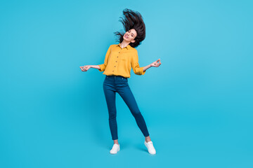 Fototapeta na wymiar Full size photo of funny brunette young lady dance wear shirt trousers shoes isolated on blue background