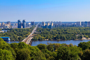 Fototapeta na wymiar Aerial view of Metro bridge and the Dnieper river in Kiev, Ukraine. Kyiv cityscape