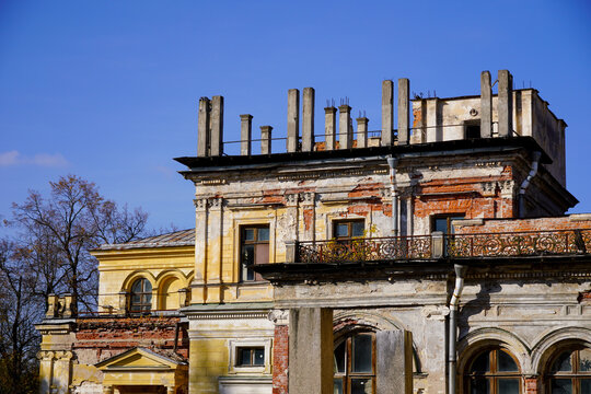 Abandoned manor Mikhailovka estate, palace and park of the 19th century. near Peterhof, public access, Saint-Petersburg, clear blue sky. High quality photo