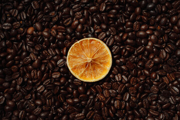 Orange slices on coffee beans