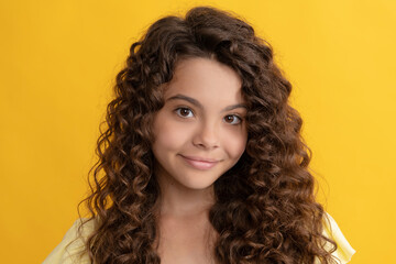 smiling kid with long curly hair and perfect skin, frizzy