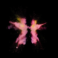 Bizarre forms of powder pink paint and flour combined explode in front of a black background to...