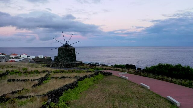 Windmill on the ocean shores of the Azores.