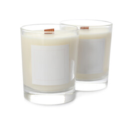 Aromatic soy candles with wooden wicks on white background