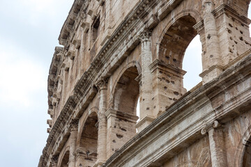 views and details of the colosseum monument in rome in Italy