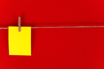 yellow paper. Red background, copy space.

