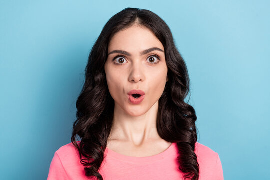 Photo Of Young Pretty Lady Impressed Fake Gossip Stupor Reaction Isolated Over Blue Color Background