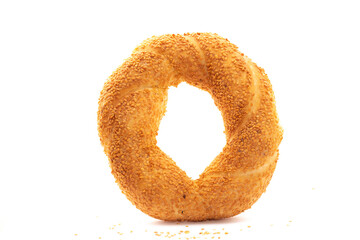 Simit or gevrek, traditional Turkish pastry food on the white wooden background