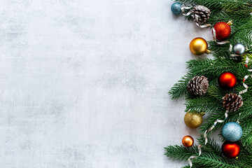 Naklejka na ściany i meble Christmas and New Year festive flat lay with xmas tree and baubles