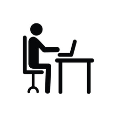 silhouette of a person working on a laptop