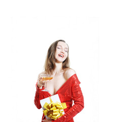 Laughing girl in red shiny dress with martini glass and a wrapped gift. Party concept, isolated on white, copy space