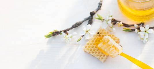 broken yellow honeycomb with honey on table. Honey products. healthy natural food concept