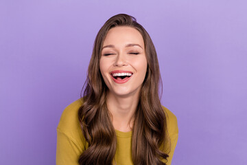 Portrait of cheerful glad person closed eyes toothy smile laughing isolated on pastel violet color background