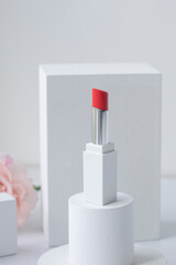 A red lipstick isolated on white background.