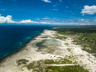 Aerial of a massive tectonic uplift in Loon, Bohol, Philippines. Uplifted limestone and coral.